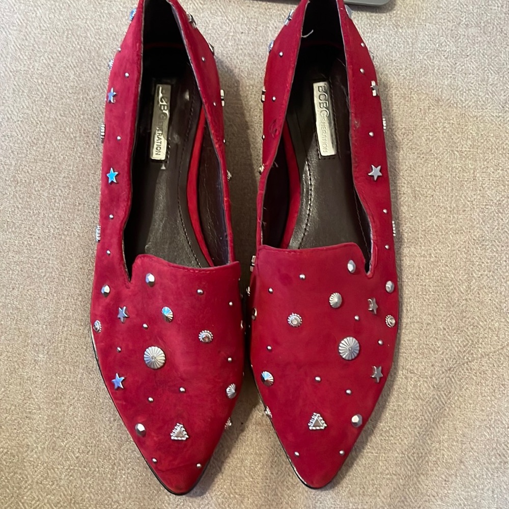 Red embellished loafers